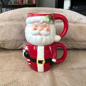 Stackable Santa coffee mugs. Never been used.
